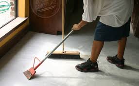 remove carpet glue from concrete floor